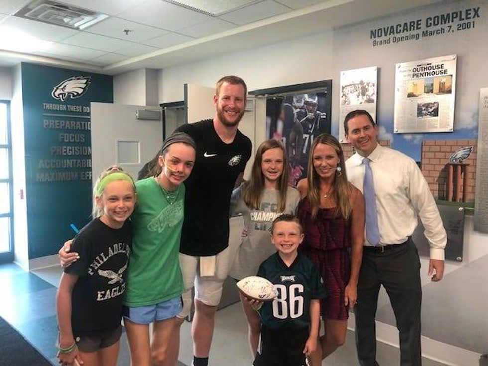 Lily Walker and her family visiting Philadelphia Eagles training camp.