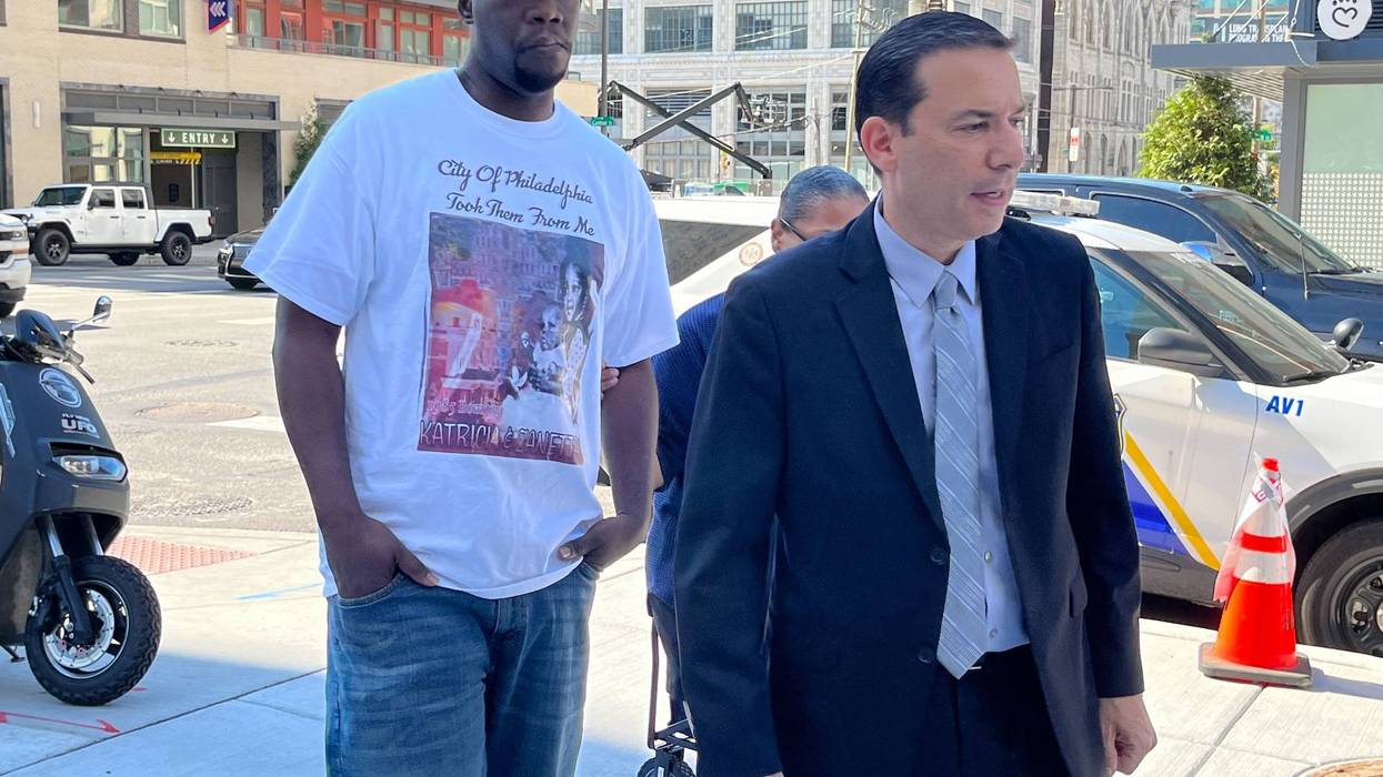 Lionel Dotson (left) walks into the Philadelphia Medical Examiner's Office on Aug. 3, 2022, to obtain the remains of his sisters: 1985 MOVE bombing victims Katricia and Zanetta Dotson.