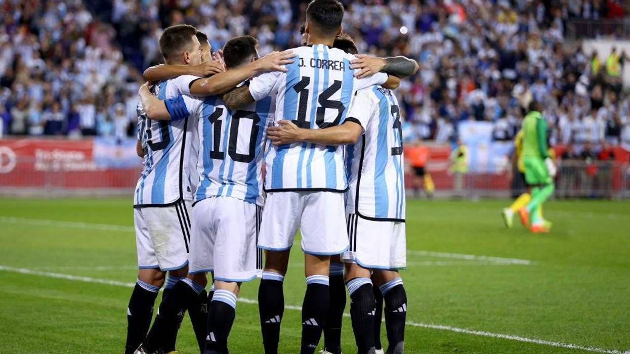 Lionel Messi #10 of Argentina is congratulated by teammates after he scored in the second half against Jamaica at Red Bull Arena on September 27, 2022 in Harrison, New Jersey. Argentina defeated Jamaica 3-0.