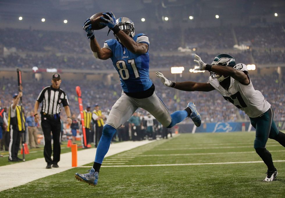Lions receiver Calvin Johnson stretches for a touchdown