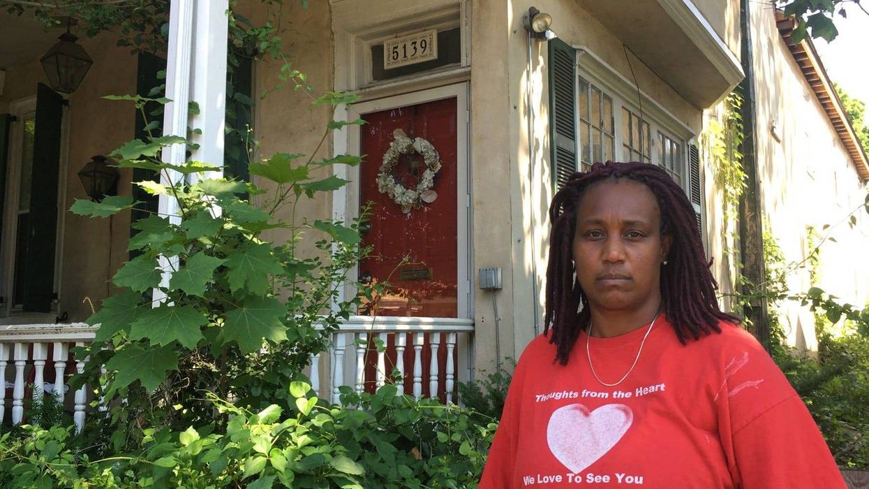 Lisa Scott stands in front of the historic Joseph T. Pearson house.