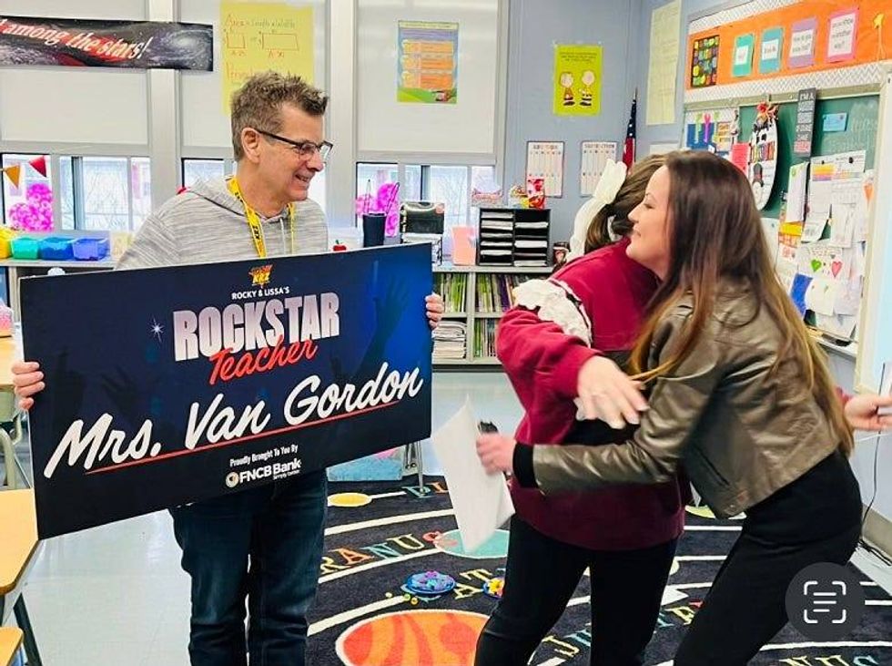 Liss hugging Rockstar Teacher Mrs. Van Gorden