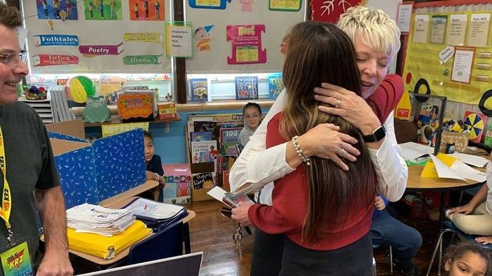 Lissa hugging Mrs. Martinelli