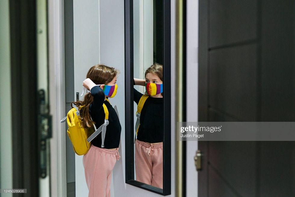 Little girl backpack mask