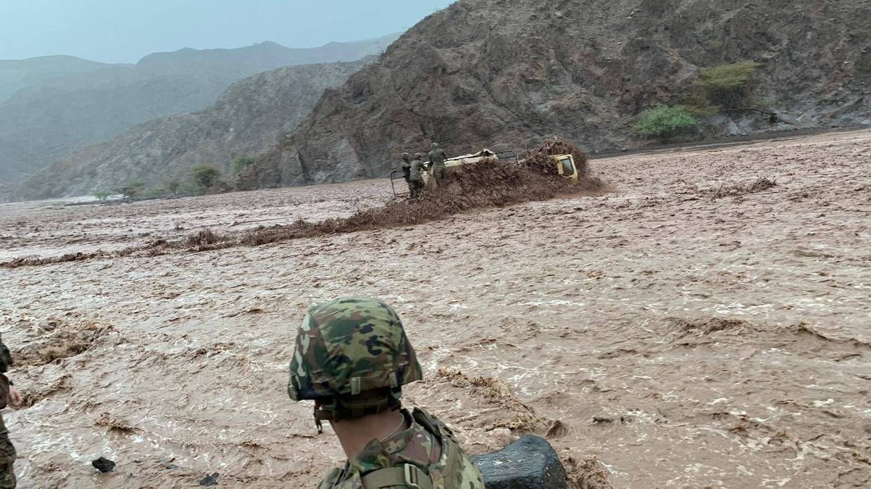 LMTV rolls over in flood waters