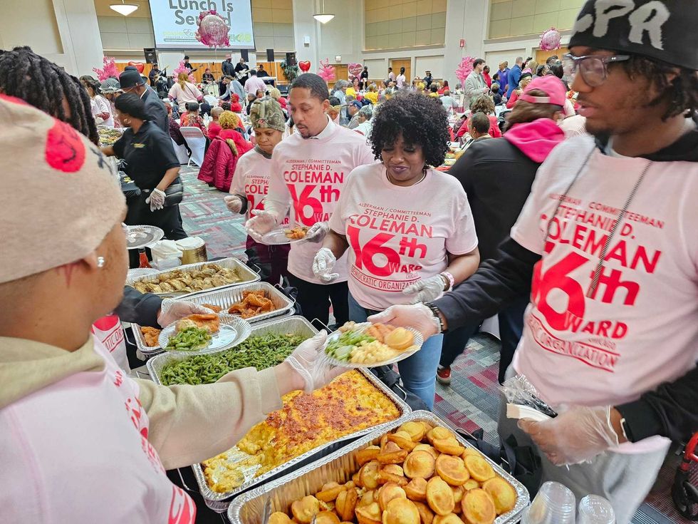 Local vets and seniors enjoyed music from a live blues band, heaping plates of soul food and a raffle at Kennedy King College