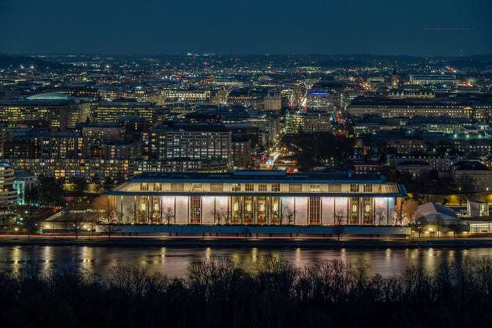 Long exposure of the Washington DC skyline including the Potomac River and the Kennedy Center illuminated.