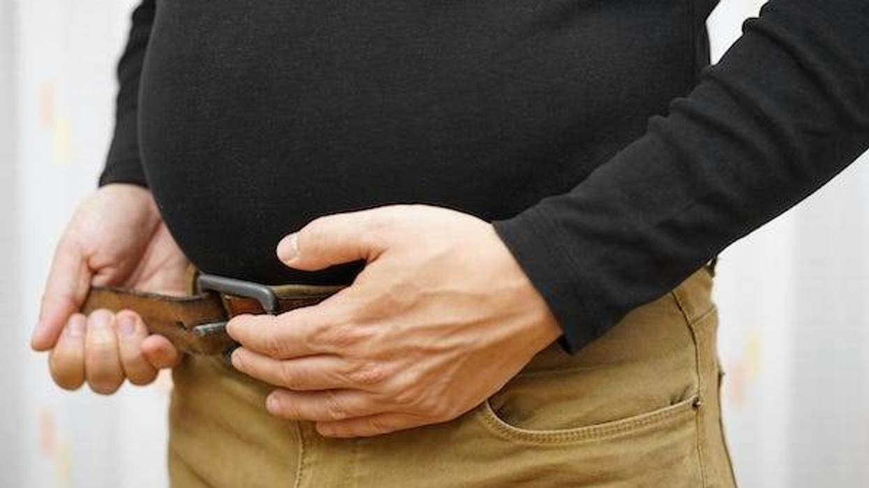 Loosening belt around big stomach