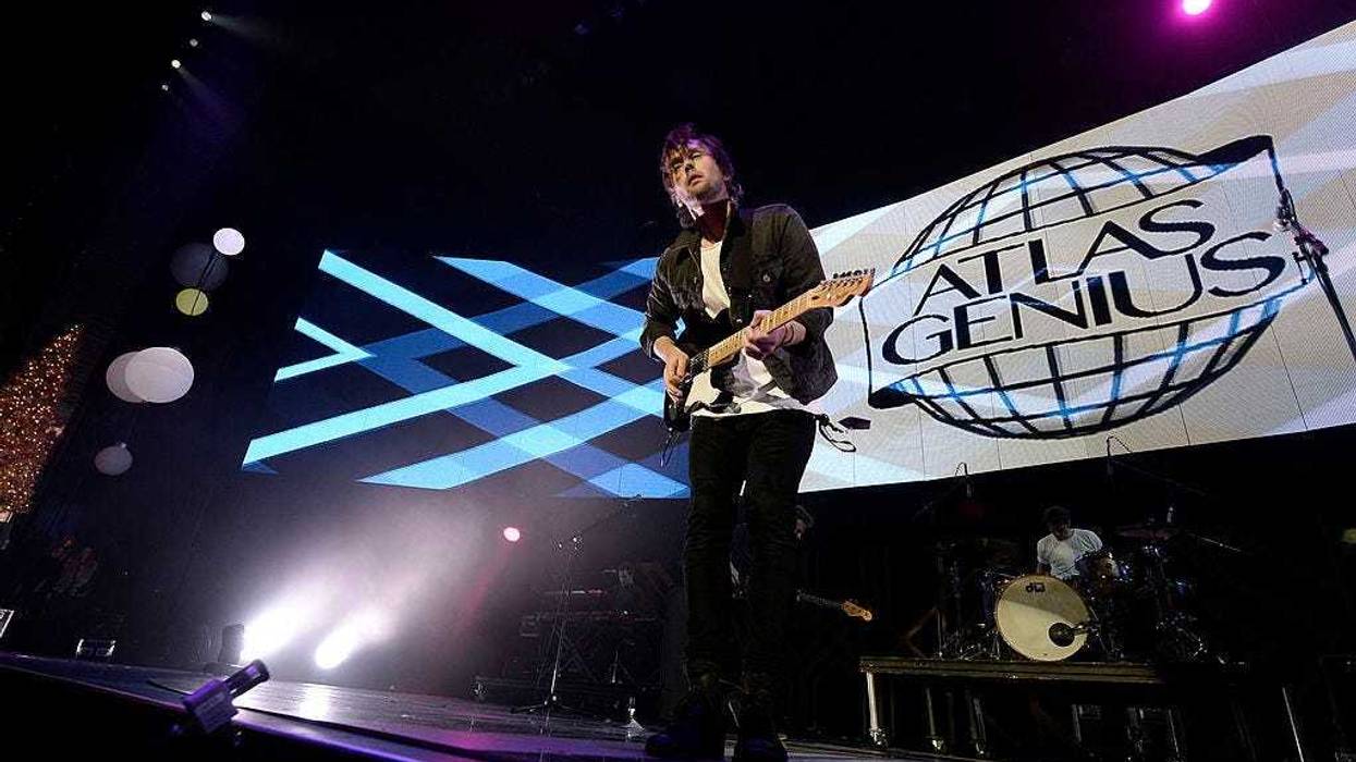 LOS ANGELES, CA - DECEMBER 08: Musician Keith Jeffery of Atlas Genius performs onstage during The 24th Annual KROQ Almost Acoustic Christmas at The Shrine Auditorium on December 8, 2013 in Los Angeles, California. (Photo by Kevin Winter/Getty Images for R