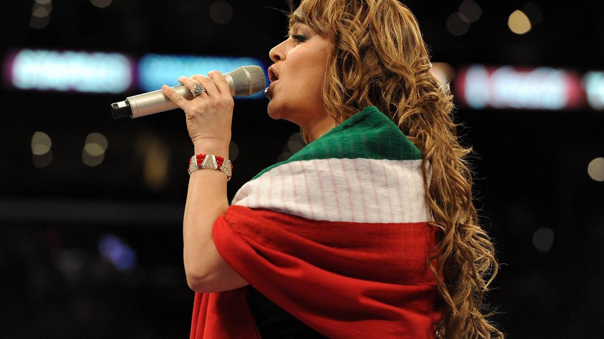LOS ANGELES, CA - SEPTEMBER 18: Jenny Rivera sings the Mexican national anthem before the Middleweight bout against Shane Mosley and Sergio Mora at Staples Center on September 18, 2010 in Los Angeles, California.