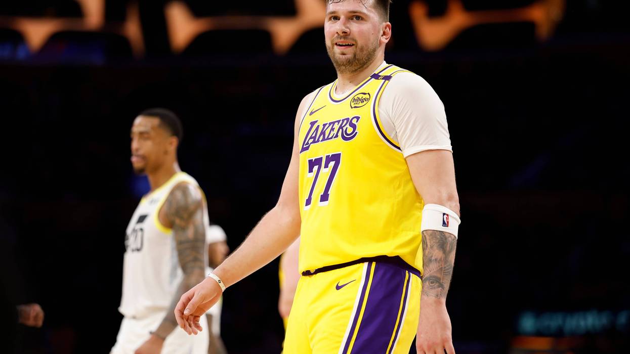 LOS ANGELES, CALIFORNIA - FEBRUARY 10: Luka Doncic #77 of the Los Angeles Lakers reacts after committing his third foul during the third quarter of a game against the Utah Jazz at Crypto.com Arena on February 10, 2025 in Los Angeles, California.
