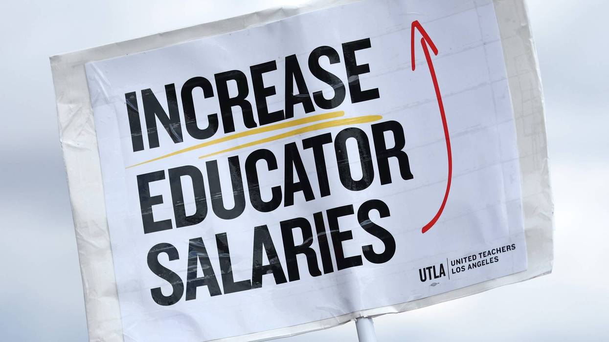 LOS ANGELES, CALIFORNIA - MARCH 23: A sign reads 'Increase Educator Salaries' as Los Angeles Unified School District (LAUSD) workers and supporters rally in Los Angeles State Historic Park on the last day of a strike over a new contract on March 23, 2023 in Los Angeles, California.