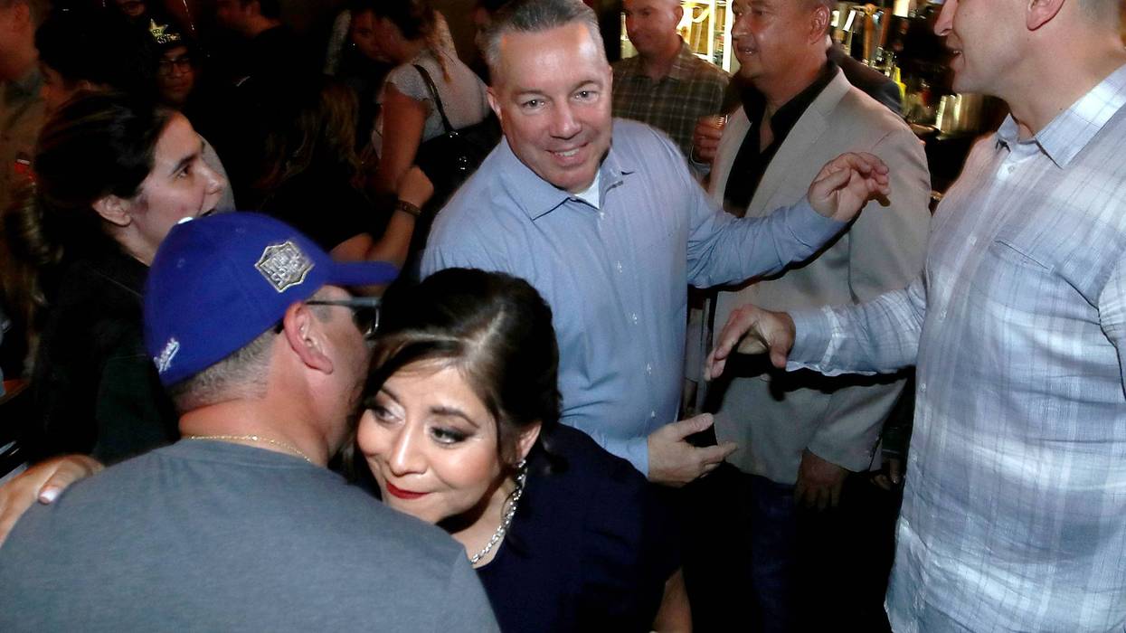 Los Angeles County Sheriff Alex Villanueva meets with supporters at an election night gathering in Boyle Heights on Tuesday, June 7, 2022.