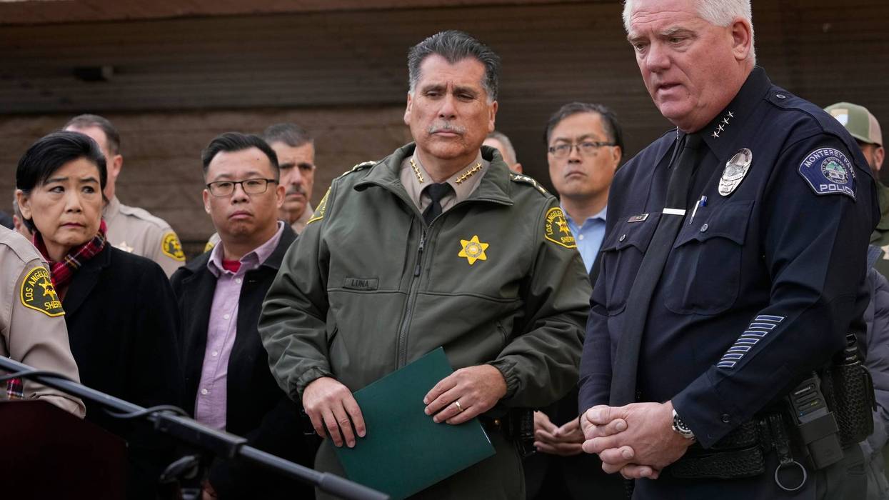 Los Angeles County Sheriff Robert Luna, at podium, briefs the media outside the Civic Center in Monterey Park, Calif., Sunday, Jan. 22, 2023. Monterey Park Mayor Henry Lo, second from right. A mass shooting at a Los Angeles-area ballroom dance club following a Lunar New Year celebration, set off a manhunt for the suspect.