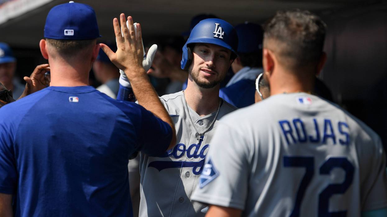 Dodgers clinch 5th straight NL West title, 13th in 14 years, Tucker has 4 hits in 8-2 win over Reds