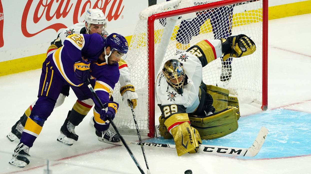 Los Angeles Kings left wing Andreas Athanasiou (22) moves in for a shot against Vegas Golden Knights defenseman Alex Pietrangelo (7) and goaltender Marc-Andre Fleury (29) during the third period at Staples Center.