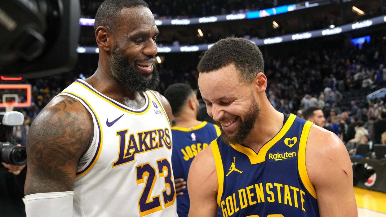 Los Angeles Lakers forward LeBron James and Golden State Warriors guard Stephen Curry talk after a game last season.