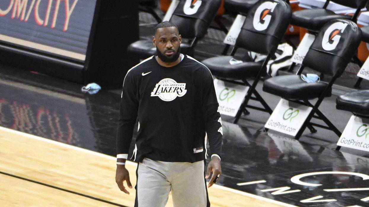Los Angeles Lakers forward LeBron James warms up before the game against the Chicago Bulls at United Center.