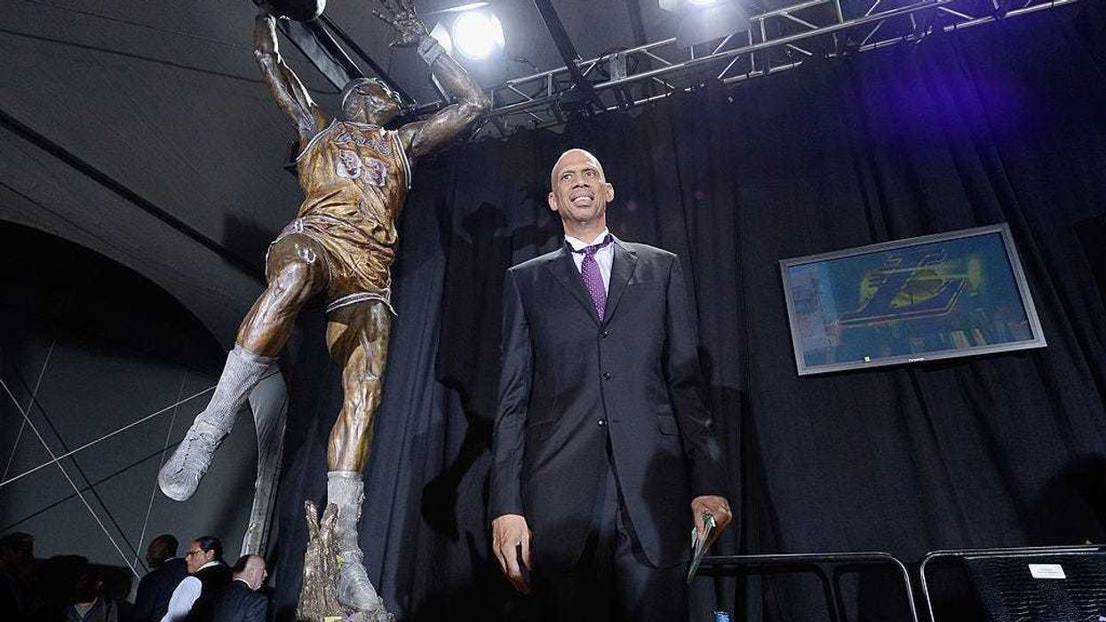 Los Angeles Lakers legend Kareem Abdul-Jabbar unveils a statue of himself at Staples Center on November 16, 2012, in Los Angeles, California.