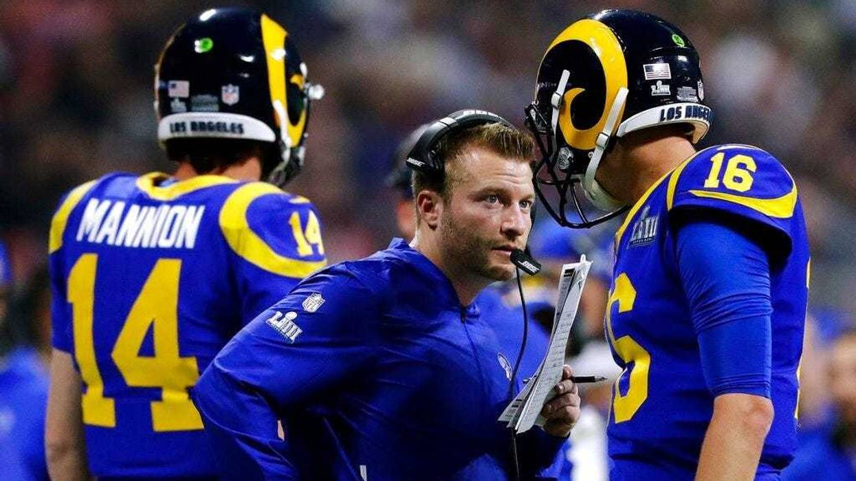 Los Angeles Rams head coach Sean McVay, center, speaks to Jared Goff (16) on the sideline during the second half of the NFL Super Bowl 53 football game against the New England Patriots, Sunday, Feb. 3, 2019, in Atlanta