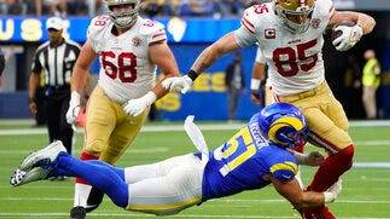 Los Angeles Rams holder Johnny Hekker (6) celebrates with teammates after kicker Matt Gay kicked the game-winning field goal against the Tampa Bay Buccaneers during the final seconds of an NFL divisional round playoff football game, Sunday, Jan. 23, 2022, in Tampa, Fla.