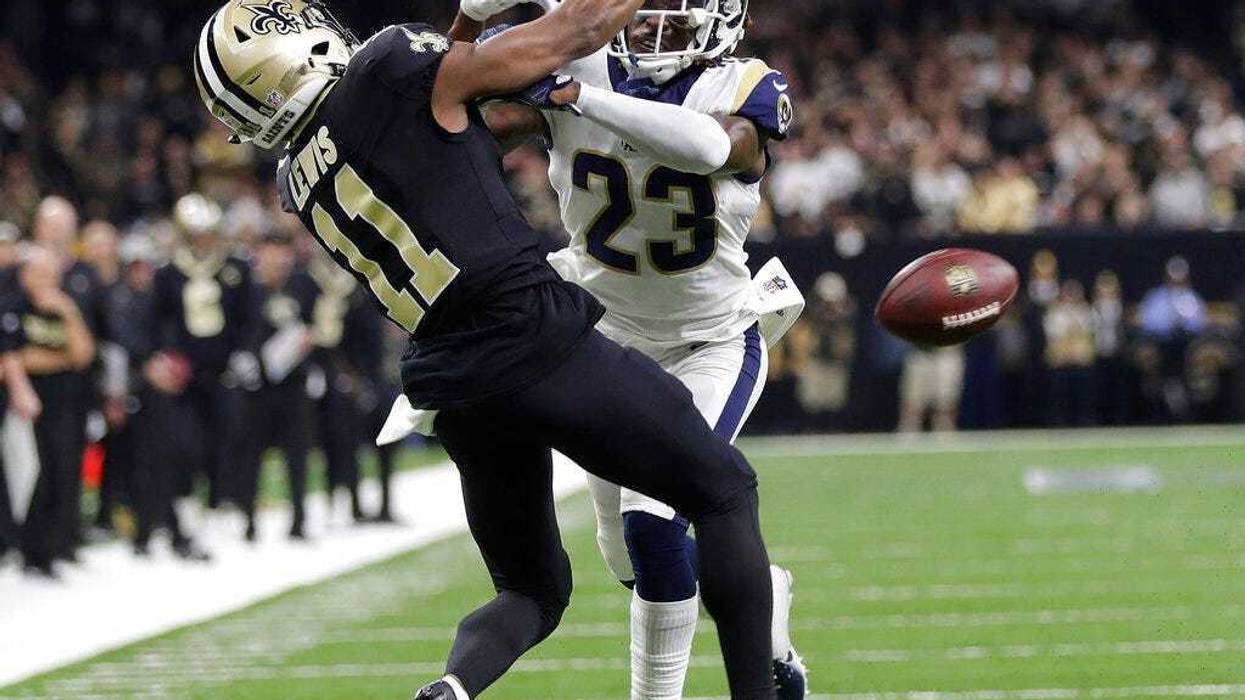 Los Angeles Rams' Nickell Robey-Coleman breaks up a pass intended for New Orleans Saints' Tommylee Lewis