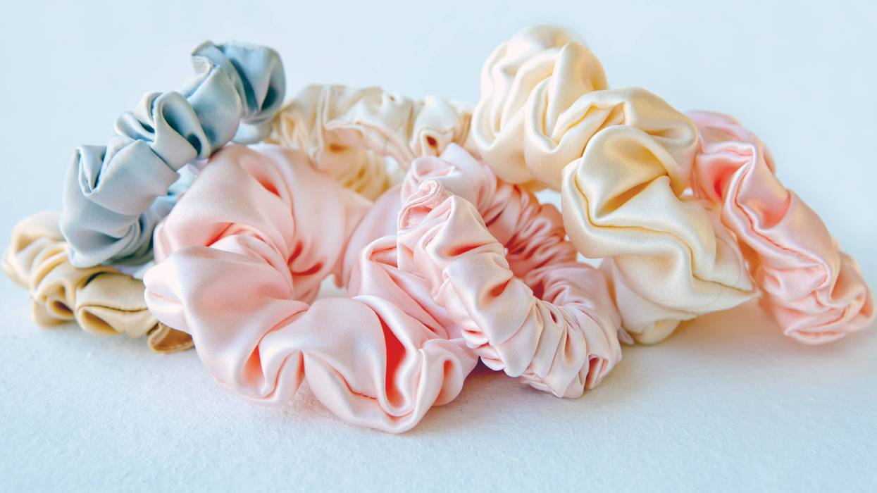 Lot of Colorful silk Scrunchies isolated on white. Flat lay Hairdressing tools and accessories. Hair Scrunchies, Elastic HairBands, Bobble Sports Scrunchie Hairband