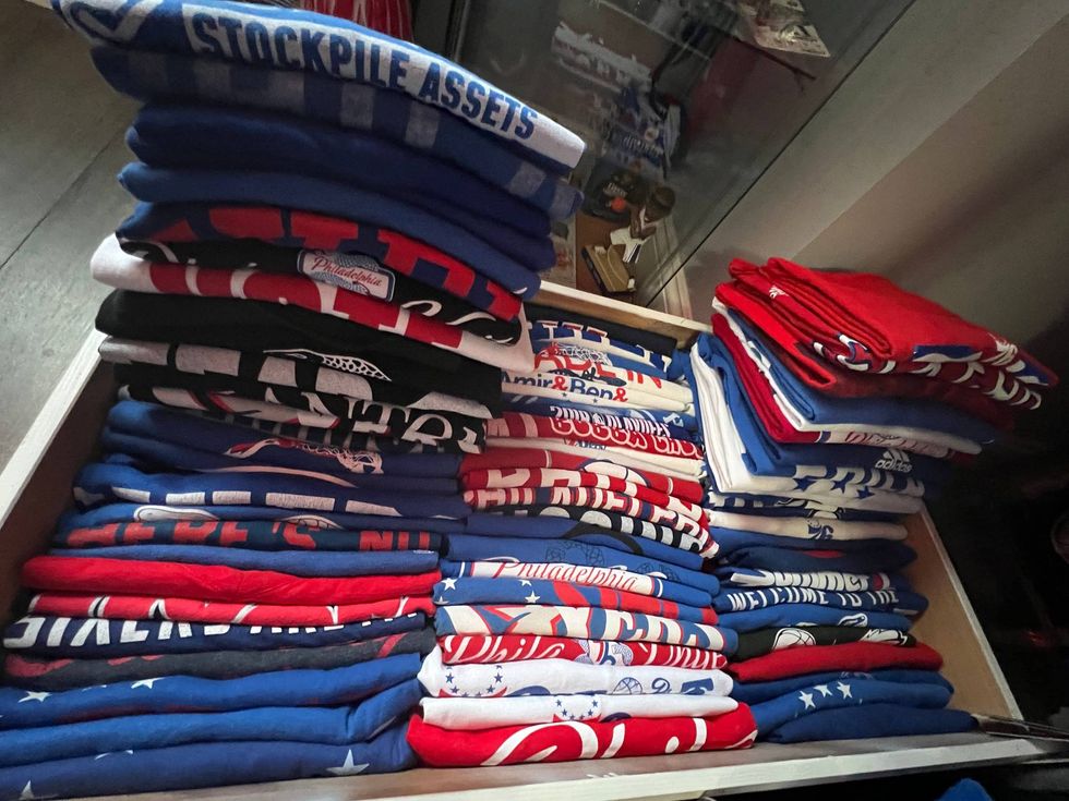 Lots, and lots, of Philadelphia 76ers t-shirts owned by Lauren Gordon.