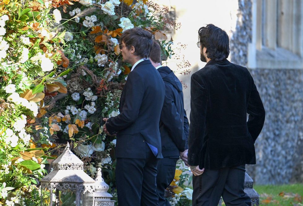 Louis Tomlinson and Zayn Malik (R) attend the funeral for singer Liam Payne