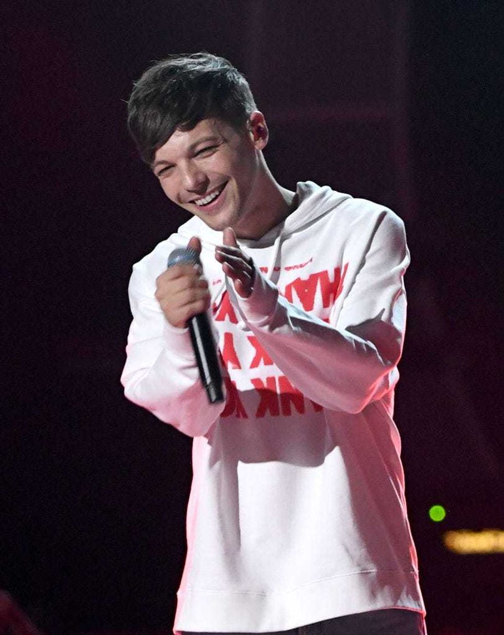 Louis Tomlinson performs onstage