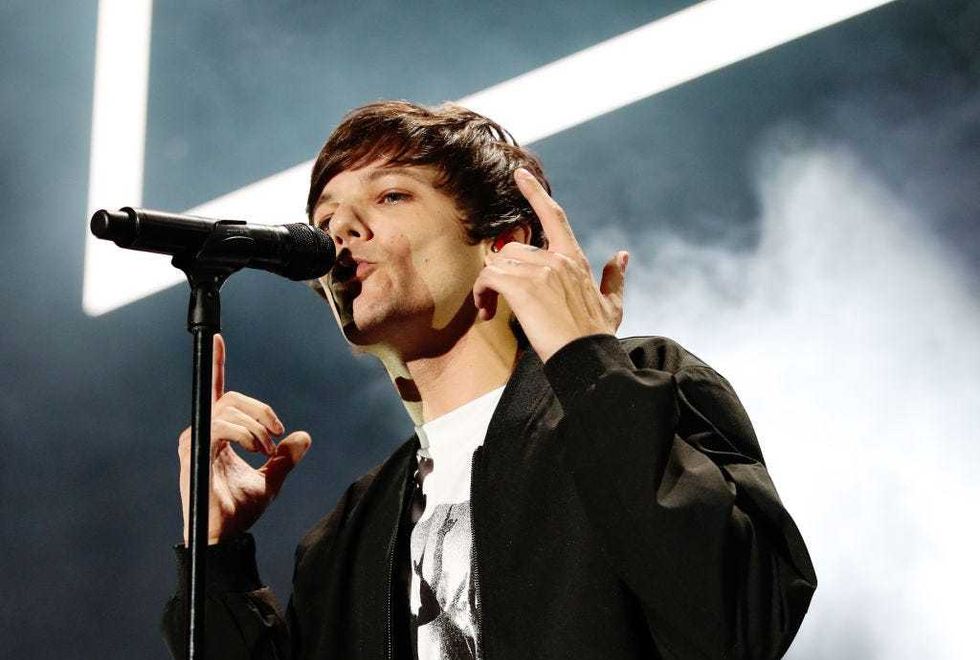 Louis Tomlinson performs onstage