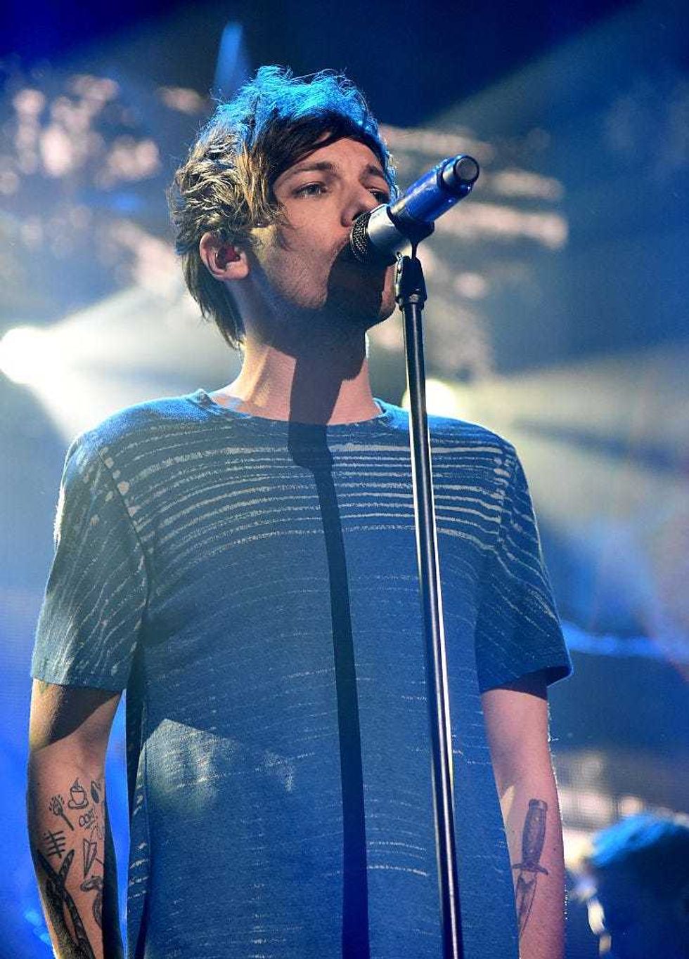 Louis Tomlinson performs onstage