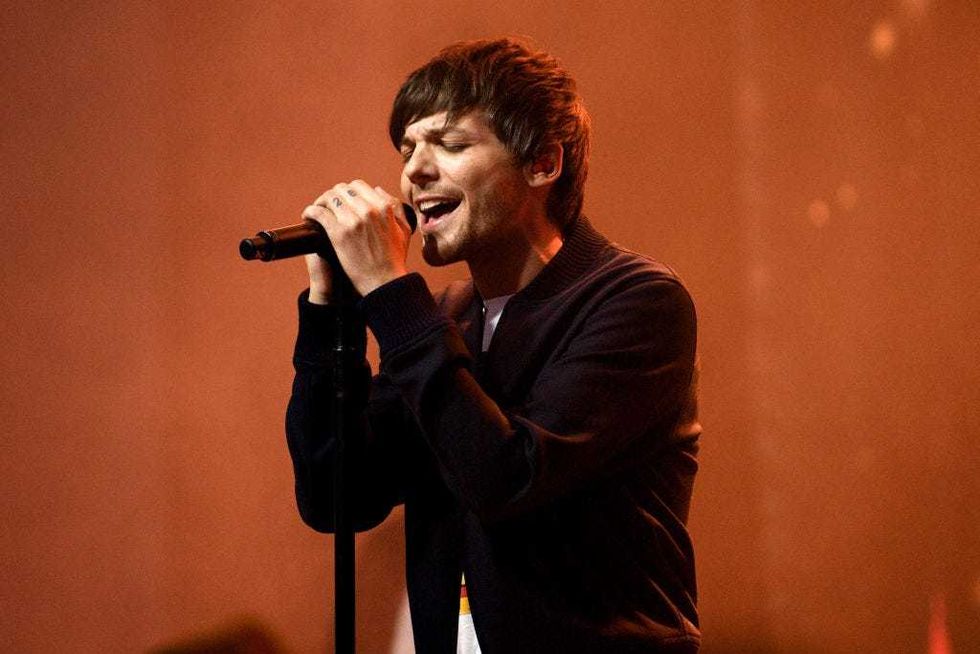 Louis Tomlinson performs onstage