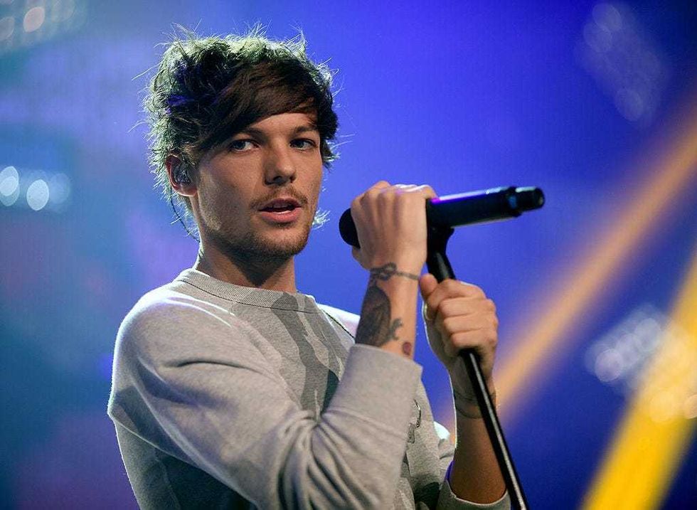 Louis Tomlinson performs onstage