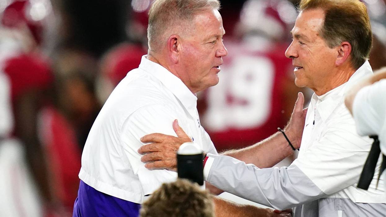 LSU coach Brian Kelly with former Alabama coach Nick Saban