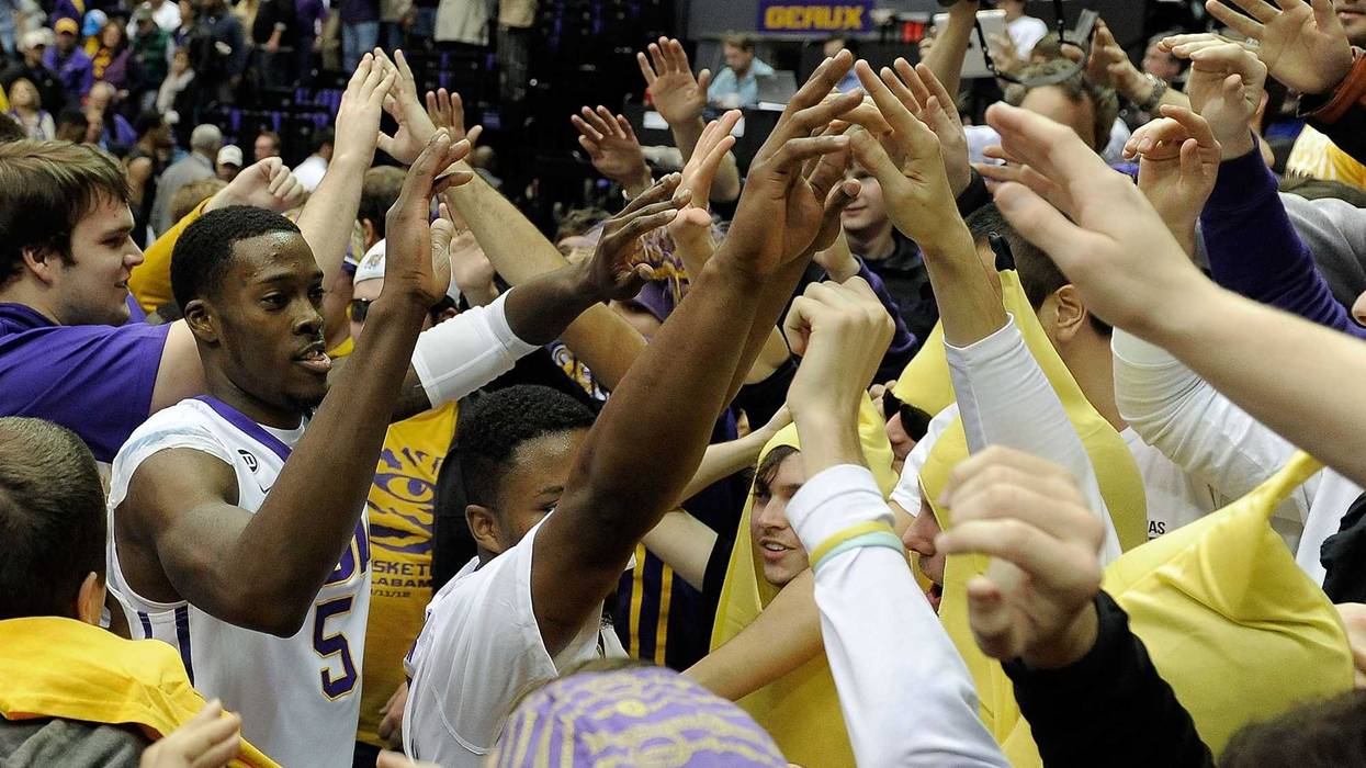 LSU players celebrate after a 2014 victory.