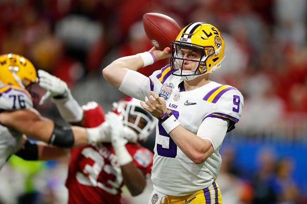 LSU QB Joe Burrow throws a pass in the Peach Bowl.