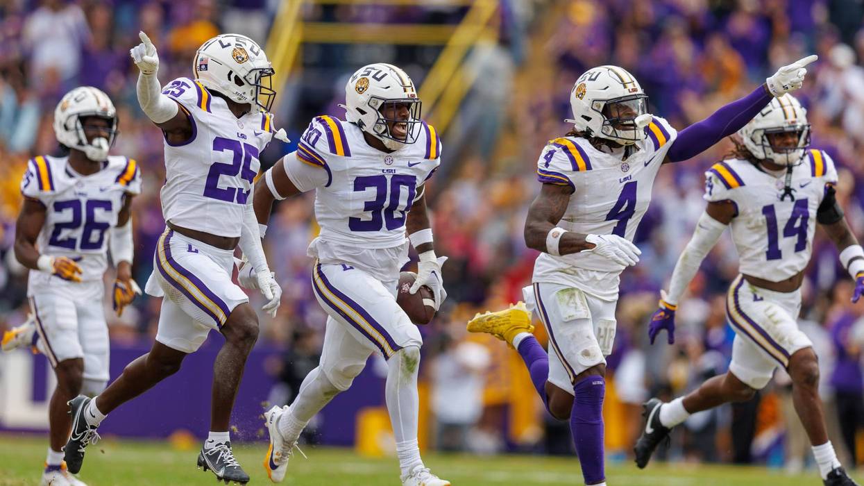LSU Tigers linebacker Greg Penn III (30) reacts to getting an interception