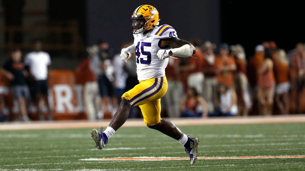 LSU Tigers linebacker Michael Divinity Jr. (45) celebrates a sack against the Texas Longhorns in the second half at Darrell K Royal-Texas Memorial Stadium.
