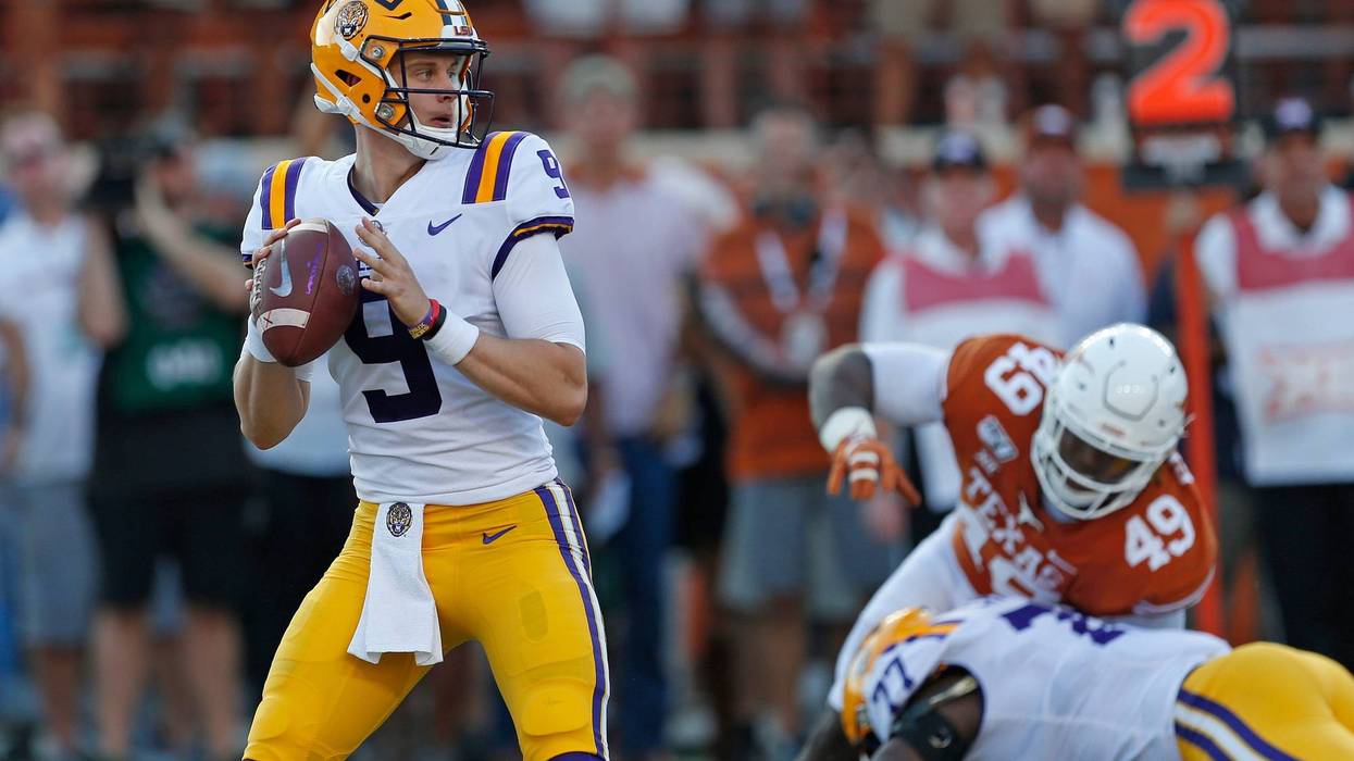LSU Tigers quarterback Joe Burrow (9) looks to pass against the Texas Longhorns in the first half at Darrell K Royal-Texas Memorial Stadium.