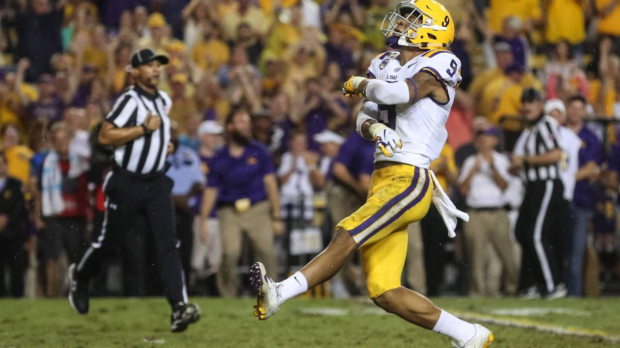 LSU Tigers safety Grant Delpit (9) celebrates after sacking Mississippi Rebels quarterback Jordan Ta'amu (not pictured) during the first quarter of a game at Tiger Stadium.