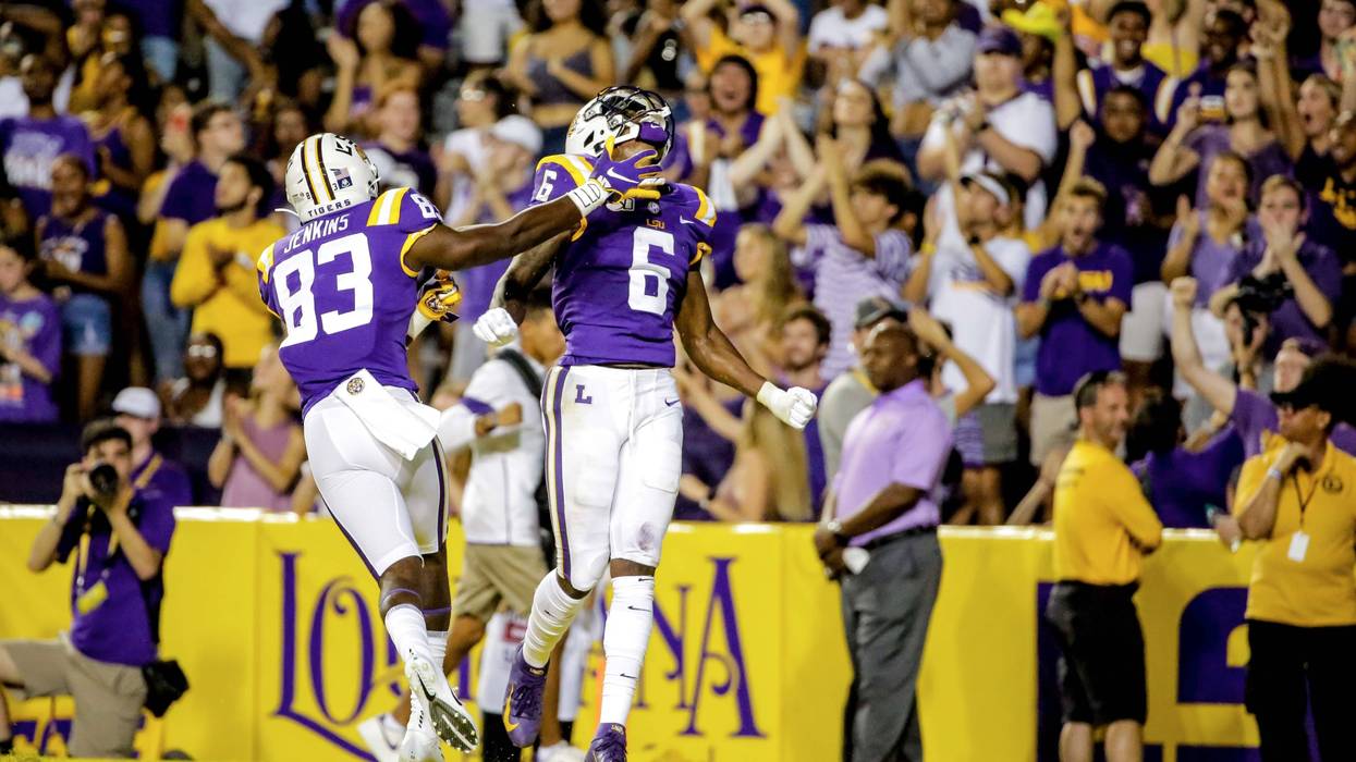 LSU Tigers wide receiver Terrace Marshall Jr. (6) celebrates with wide receiver Jaray Jenkins (83) after a touchdown catch against the Northwestern State Demons during the second quarter at Tiger Stadium.