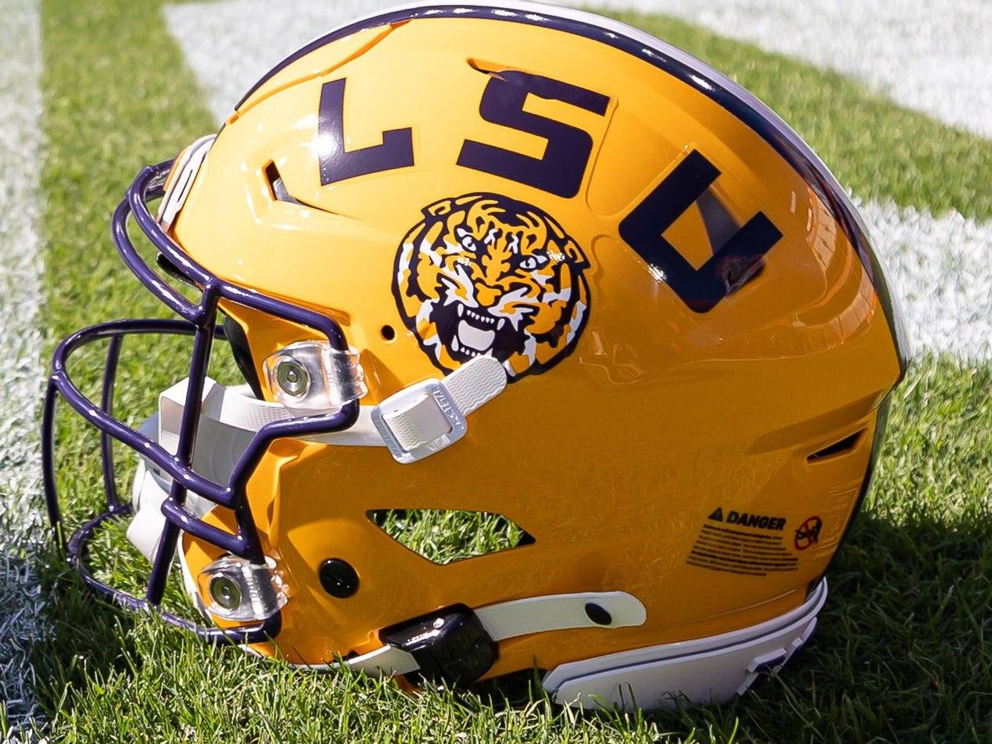 coen brothers football helmet SEC Riddell Speed Replica point chinstrap LSU puts a bow on