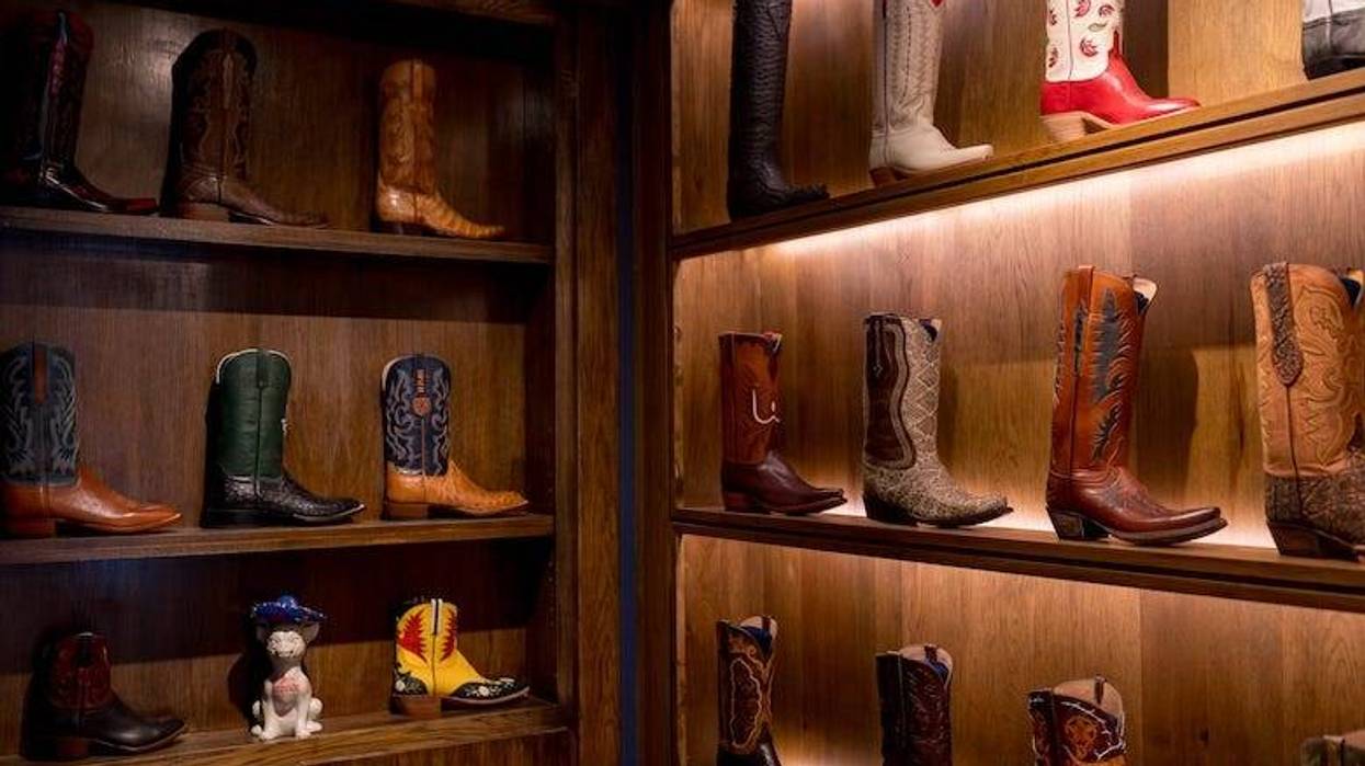 Lucchese boots on a shelf