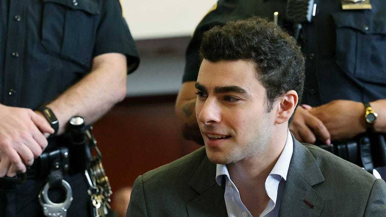 Luigi Mangione appears with his lawyers for a hearing in the killing of UnitedHealthcare CEO Brian Thompson in Manhattan Criminal Court on December 11, 2025 in New York City.