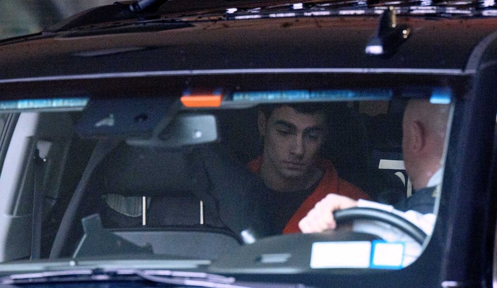 Luigi Mangione, suspect in the killing of UnitedHealthcare CEO Brian Thompson, departs after a hearing at Blair County Courthouse on December 19, 2024
