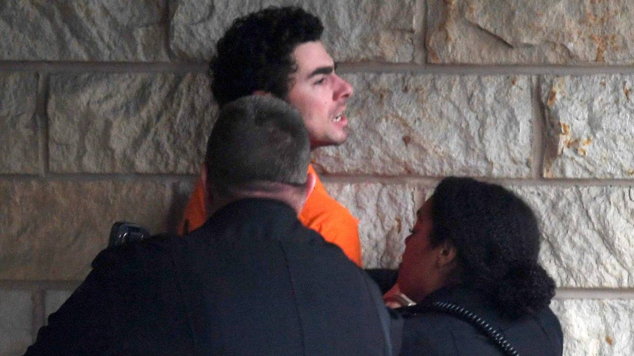 Luigi Nicholas Mangione is escorted into Blair County Courthouse on Dec. 10, 2024, in Hollidaysburg, Pennsylvania.