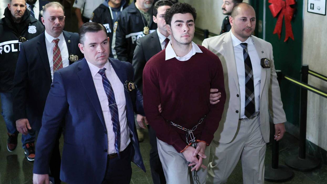 Luigi Nicholas Mangione is shackled as he arrives at Manhattan Criminal Court in New York on December 23, 2024