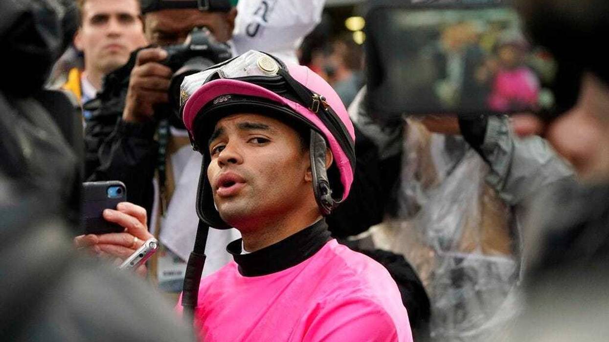 Luis Saez reacts after Maximum Security was disqualified