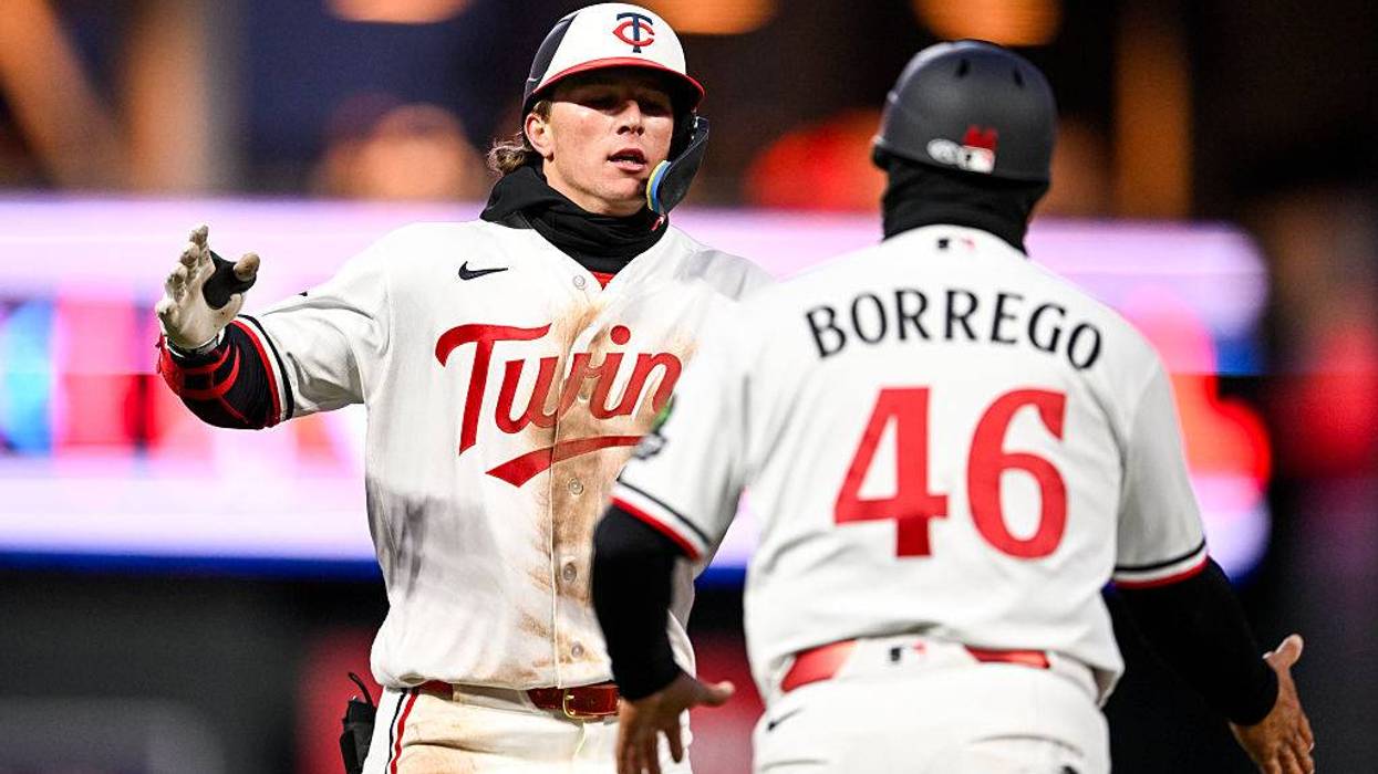 Keaschall hits a 2-run homer and the Twins hold on for a frigid 7-3 win over the Tigers